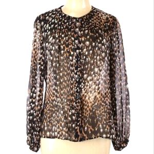 Trina Turk Animal Print 100% Silk blouse.